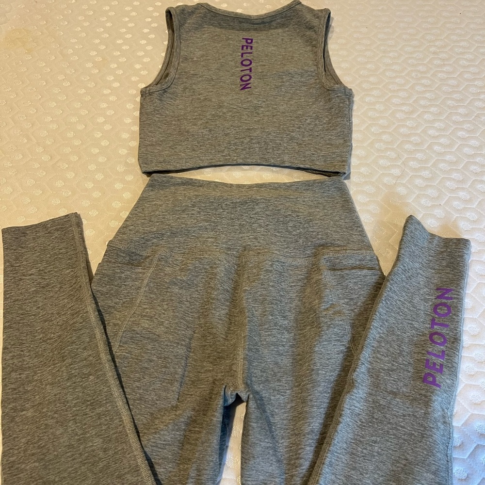 Beyond Yoga x Peloton set.  Grey w/ purple logo detail, space-dye luxe fabric.